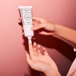 frank body everyday face moisturiser being squeeze onto fingers