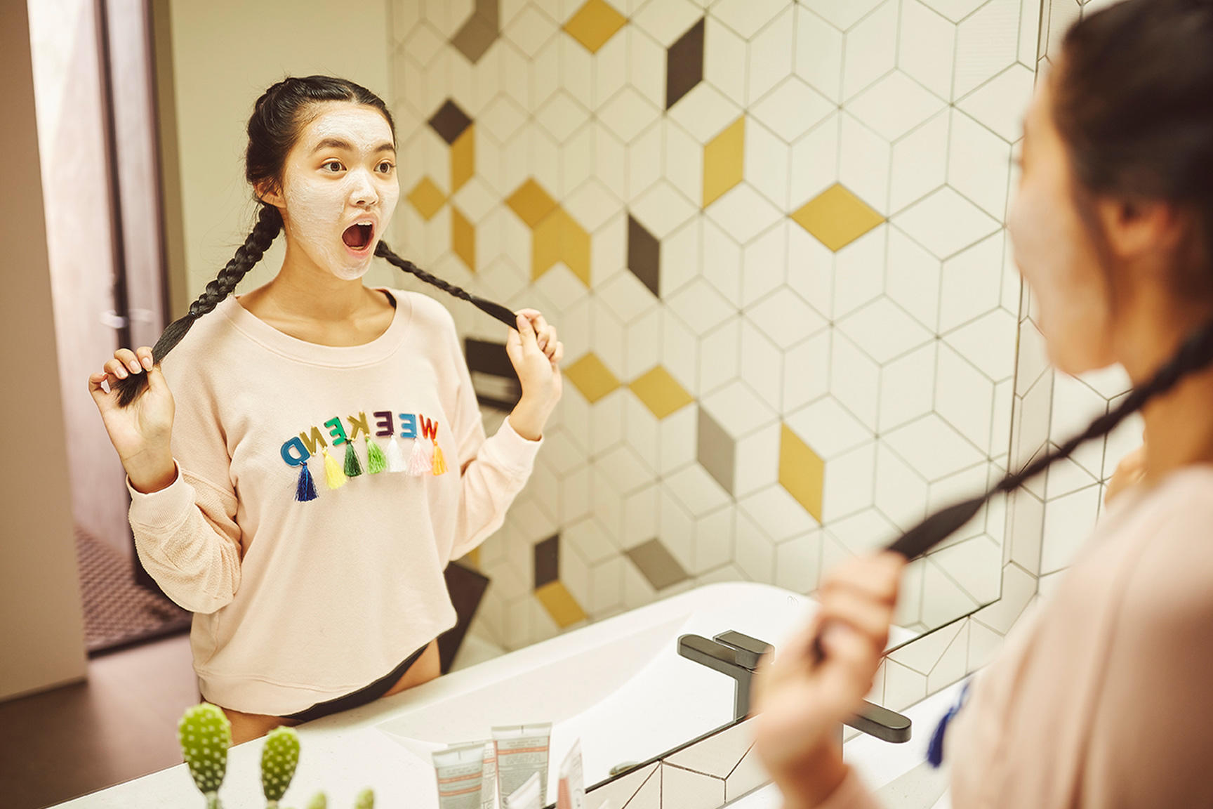 girl wearing face mask with pigtails